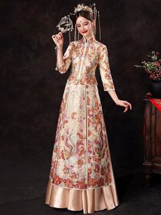 ⭐ Premium Handmade Item, High End Quality Gown; The very Elegant quality for Brides; ⭐ Item High Light: Classical Red Color; 4D Solid Tailor to Show Bride's Shape Beauty; Premium Satin Material Surface; Embroidery Golden Pattern盘金绣; Tassel jewelry decoration in front Chest and Sleeves/ Hemline; Tassel Satin with Pattern Skirt; Symmetrical Art design to show the beauty of Chinese Royal Wedding Fashion. ⭐ Made for Spring/Summer/ Autumn Season; Clothing Match Tips: Match to Loose Qipao Jacket/ High Chinese Wedding Guest Outfit, A-line Wedding Dress With Intricate Embroidery, Traditional A-line Embroidered Dress, Brocade Wedding Dress With Gold Embroidery, Traditional Beige Wedding Dress, Long Sleeve Floral Embroidery Dress For Ceremony, Long Sleeve Dresses With Floral Embroidery For Ceremony, Fitted Floor-length Gown With Multicolor Embroidery, Ceremonial Dresses With Floral Embroidery