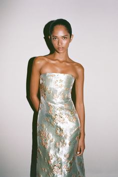 This is a strapless midi length gown with an interior corset and a pleated train at the back. The Kennedy is crafted from a metallic brocade fabric making it perfect for a special occasion. Spring Cocktail Dress, Midi Bridesmaid Dress, Brocade Dress, Black Tie Wedding Guests, Prom Inspo, Vibe Check, Brocade Dresses, Guest Attire, Wedding Attire Guest