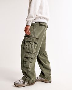 On-trend cargo pants in our comfortable rigid twill fabric and an ultra baggy fit through the leg, featuring side pockets, belt loops, interior drawcords and cargo-style pockets. Utility Pants Men, Male Features, Pocket Craft, Men's Bottoms, Baggy Cargo Pants, Utility Pants, Cargo Style, Green Material, Pocket Bag