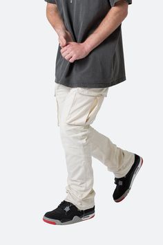 the Bootcut Cargo Pants are designed with our new B fit, which is slim through the thigh and features a slight flare at the leg opening and is constructed from washed twill, with a vintage wash, and finished with tonal self panelling. details flare at leg opening 100% cotton model is 6’1, 140 lbs and wears a size 30 Bootcut Cargo Pants, Layered Hoodie, 140 Lbs, Fuzzy Cardigan, Slim Denim, Denim Flares, Knit Shorts, Band Tees, Black Cardigan