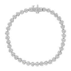 Create your signature look by wearing this elegant diamond tennis link bracelet. Featuring a seamless row of heart accents, adorned with rose-cut diamonds and set in a sterling silver framing this bracelet has a classy appearance. This modern bracelet makes a perfect Valentine's Day gift, or as a unique twist on a promise ring; it's a classic romantic surprise she'll want to show off every day! Subtle yet dazzling, the bracelet comes with a sturdy clasp, which will allow this masterpiece to sit Modern Bracelet, Romantic Surprise, Modern Bracelets, Luxe Jewelry, Signature Look, Bracelet Collection, Earrings Collection, Rose Cut Diamond, Tennis Bracelet