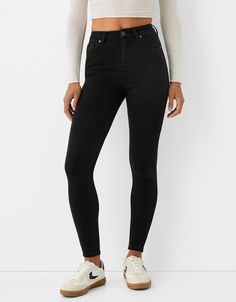 Super high-rise skinny jeans - Jeans - BSK Teen | Bershka Trendy High Rise Slim Fit Bottoms, Trendy High Rise Fitted Jeans, Trendy Tight High Waist Bottoms, Trendy Stretch High Waist Cropped Jeans, Trendy Fitted High Waist Cropped Jeans, Casual High Waist Tight Jeans, Tight High Waist Jeans, High Rise Jeans With Five Pockets, High Rise Slim Fit Jeans For Fall