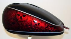 a close up of a motorcycle mirror with skulls on it