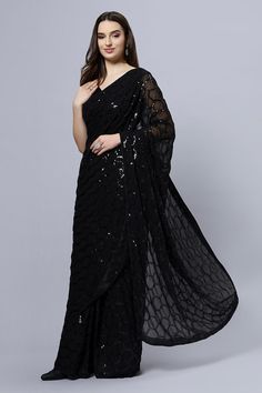 Behold This is too Hot to Handle! Anna Black Faux Georgette Sequins One Minute Saree - Classy & Sassy! A modern Faux Georgette Saree with pallu and front in black sequins in a beehive pattern all over. The saree drapes like a dream! A lightweight and versatile saree! About this Product Saree: Saree Color: Black Saree Fabric: Faux Georgette Type of Work: Black Sequin Drape Style: Choose the drape style while order: Standard Open, Pleated or Gujarati Saree length: 5.5 meters Petticoat: Saree comes Glamorous Black Fitted Pre-draped Saree, Black Pre-draped Saree With Sequins, Festive Black Pre-draped Saree With Self Design, Black Pre-draped Saree With Pallu For Party, Black Saree With Sheer Dupatta For Reception, Elegant Black Pre-draped Saree With Sequins, Black Sequined Pre-draped Saree, Elegant Black Pre-draped Saree For Diwali, Festive Black Pre-draped Saree With Sequins