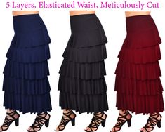 "-Premium polyester spandex: feel the difference -8 tiered ruffles that gracefully cascade across the skirt -Slimming: Asymmetric flared look has a slimming effect -Comfortable: elasticated waist means a snug, comfortable fit every time -Versatile: Travel, office, casual, fun; a true wherever and whenever skirt -True to size: Hand tailored specifically for our US customers (not unreliable Asian sizes that always run small) -Premium wrinkle resistant polyester spandex: feel the difference -5 tier Elegant Tiered Black Bottoms, Elegant Tiered Bottoms For Summer, Elegant Layered Bottoms For Summer, Elegant Black Tiered Bottoms, Elegant Layered Summer Bottoms, Solid Tiered Ruffled Skirt, Stretch Tiered Ruffle Skirt, Stretch Tiered Skirt With Ruffles, Layered Fitted Skirt For Summer