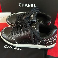 Authentic Brand New Chanel Sneakers In Black Calfskin, Size 36. Including: Box, 2 Dust Bags, A Chanel Booklet. True To Size. Luxury Black Sneakers With Logo, Black Calf Leather Sneakers With Logo, Luxury Black Sneakers With Embossed Logo, Designer Black Sneakers With Round Toe, Luxury Black Sneakers With Perforations, Luxury Black Lace-up Sneakers, Designer Black Leather Sneakers, Black Sneakers For Streetwear, Stylish Black Sneakers For Streetwear