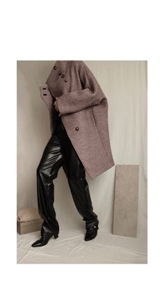 Make a bold fashion statement this winter with our oversized bouclé wool coat. This cocoon coat features a high collar, a wrap-over lapel with concealed button closure, side  seam pockets, and full lining. The kimono sleeves add a touch of elegance, while the relaxed, boxy fit ensures effortless layering. Stay warm and stylish all season long.  ⏀While it supports beautifully the boxy silhouette of this coat, bouclé wool can be quite stiff to the touch. ⏀Crafted with 3 yards of fabric, this coat Elegant Oversized Turtleneck Outerwear, Chic Oversized Turtleneck Outerwear, Oversized Brown Turtleneck Outerwear, Turtleneck Trendy Workwear Outerwear, Trendy Turtleneck Outerwear For Work, Oversized Chic Wool Sweater Coat, Chic Oversized Wool Sweater Coat, Oversized Structured Wool Coat For Winter, Chic Oversized Structured Wool Coat