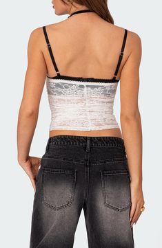 This lovely lace cami is designed in a cropped silhouette with flirty ruching down the front. Sweetheart neck Adjustable straps 95% polyester, 5% spandex Machine wash, dry flat Imported Lace Crop Top With Built-in Bra, Lace Crop Top Tank With Lace Trim, Fitted Lace Camisole With Built-in Bra, Fitted Flirty Camisole Crop Top, Fitted Lace Cami Crop Top, Lace Crop Top With Lace Trim, Lace Crop Top Tank Top, Fitted Cropped Lace Tank Top, Fitted Lace Crop Top Tank