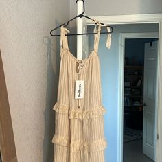 Us Size Xs. Nwt Paid $100, Asking $20. Crwam Nudes Color. Never Worn Cotton Midi Dress With Ruffles For Daytime, Daytime Tiered Ruffle Dress, Daytime Sundress With Ruffles, Chic Daytime Maxi Dress With Ruffles, Summer Midi Dress With Ruffles For Daytime, Casual Cream Sundress With Ruffles, Chic Ruffled Maxi Dress For Daytime, Flowy Maxi Dress With Ruffles For Daytime, Daytime Ruffled Sundress Midi Dress