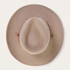 The Santa Fe Outdoor Hat is constructed of crushable wool felt and features a pinch front crown, interior dri-lex sweatband and studded leather hat band. Wool Felt Made in U.S.A. Brim: 3 1/4" Crown: 4" Water and Weather Resistent Outdoor Collection Modern Cowboy, Outdoor Hat, Leather Hat, Wide Trousers, Outdoor Hats, Thigh Boot, Leather Hats, Studded Leather, Hat Band