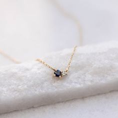 Blue Sapphire Diamond necklace in 14K solid yellow gold in cluster set. A minimal necklace for women with natural gemstones. A great gift for her. D E T A I L S● Metal: 14K solid gold, 14K white gold or 14K rose gold● Gemstones: Sapphire, round cut 3mm, Diamond, brilliant cut, 2mm● Gemstones Weight: Sapphire 0.10 ct, Diamond 0.03 ct● Length: 40 cm - 16 inchesH O W ∙ T O ∙ O R D E RChoose from the drop-down menu the available options (Metal) and leave us a note for any special requirements.G I F Elegant 14k Gold Birthstone Necklace For Birthday, Elegant Yellow Gold Birthstone Necklace For Birthday, Elegant Sapphire Jewelry For Birthday, Sapphire Necklace Simple, Danty Necklace, Natural Birthday, Sapphire Diamond Necklace, Sapphire Diamond Pendant, Gold Amethyst Ring