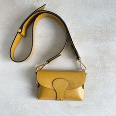 Arabella Leather Mini Crossbody Bag - OLIVIA AND GRAY LTD Daily Use Crossbody Belt Bag With Detachable Strap, Yellow Crossbody Flap Bag With Detachable Strap, Yellow Flap Bag With Adjustable Strap For Everyday Use, Yellow Crossbody Flap Bag With Adjustable Strap, Everyday Clutch Bag With Detachable Strap, Yellow Flap Bag With Detachable Strap For Daily Use, Crossbody Shoulder Bag With Removable Pouch For Everyday, Yellow Leather Flap Bag For Everyday Use, Blind Emboss