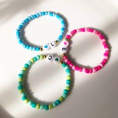 Discover the joy of Trio Friendship Bracelets for kids! These colorful, adjustable bracelets are perfect for celebrating the special bond between friends. Made from durable, skin-friendly materials, they are safe and comfortable for everyday wear. Each set includes three matching bracelets, making them ideal for sharing with best friends. Perfect for birthday gifts, party favors. Trio Friendship Bracelets are a fun and meaningful way for kids to express their friendship. Shop now and let the adv Swear Word Bracelet, Trio Clay Bead Bracelets, Playful Green Stretch Bracelet As Gift, Fun Adjustable Green Beaded Bracelets, Fun Green Stretch Bracelet For Friendship, Personalized Turquoise Friendship Bracelets As Gift, Adjustable Green Playful Bracelets, Cute Turquoise Beaded Bracelets As Gift, Playful Green Adjustable Bracelets