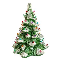 a ceramic christmas tree with lights on it