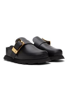 Black Buckle Mules by Proenza Schouler on Sale Leather Loafers With Tang Buckle For Work, Luxury Slip-on Loafers With Buckle Closure, Calf Leather Slip-on Clogs With Leather Footbed, Calf Leather Slip-on Loafers With Buckle Closure, Calf Leather Clogs With Leather Footbed And Round Toe, Round Toe Calf Leather Clogs With Leather Footbed, Leather Slip-ons With Buckle Closure, Modern Leather Platform Slip-ons, Leather Square Toe Loafers With Buckle Closure