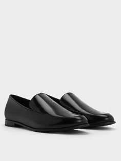 It does not get more classic than these loafers. They feature an almond-toe silhouette, a streamlined design, and a timeless black finish, exuding a chic, androgynous appeal. The 1.5cm block heels provide extra sturdiness and reliability while offering a slight lift. With unparalleled versatility, these loafers will complement everything in your wardrobe, making them perfect for everyday wear. For a trendy twist, pair them with classic white crew socks. Classic Flat Slip-ons For Business, Sleek Pointed Toe Loafers With Rubber Sole, Sleek Slip-on Formal Flats, Formal Slip-on Flats With Plain Toe, Sleek Loafers With Leather Sole And Flat Heel, Sleek Slip-on Almond Toe Loafers, Sleek Almond Toe Loafers With Rubber Sole, Sleek Pointed Toe Loafers With Branded Insole, Sleek Plain Toe Loafers For Office