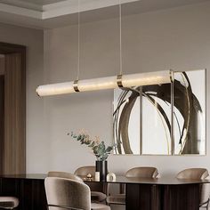 an elegant dining room with modern lighting fixtures