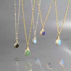 Gemstone drop necklaces Cheap Gold Necklaces With Gemstone Beads, Luxury Dainty Gemstones With Gemstone Accents, Elegant Round Pendant Charm Necklaces For Healing, Elegant Round Pendant Charm Necklace For Healing, Gold Sterling Silver Oval Pendant Birthstone Necklace, Sterling Silver Birthstone Necklace For Healing, Oval Gold Wire Wrapped Necklaces, 14k Gold Filled Gemstone Pendant Jewelry, Gold Teardrop Pendant Necklace With Gemstone Accents