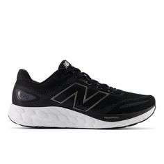 new balance fresh foam running shoe in black and white with silver accents on the upper part