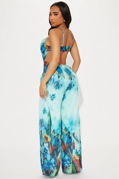 Available In Blue/combo. Jumpsuit Adjustable Spaghetti Straps Cowl Neck Back Cut Out Wide Leg Non Stretch Inseam= 33" Self: 100% Polyester Lining: 100% Polyester Imported | Best Of Days Jumpsuit in Blue size Medium by Fashion Nova Vacation Tropical Print Blue Bottoms, Casual Backless Beach Bottoms, Casual Backless Summer Bottoms, Fitted Summer Jumpsuits And Rompers With Tropical Print, Fitted Tropical Print Jumpsuits And Rompers For Summer, Fitted Printed Jumpsuits And Rompers For Beach, Casual Backless Jumpsuits And Rompers For Beach, Light Blue Sleeveless Casual Swimwear, Blue Tropical Print Bottoms For Beach Season