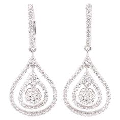 A classic elegant piece of jewelry that will get you compliments everywhere you go. 1.43 Carat of sparkling diamonds are set with meticulous craftsmanship on 14K white gold. Jewel Details: 1.43 Total Carat Weight E-F Color VS Clarity 14 K White Gold Pear-shaped Diamond Earrings For Formal Events, Platinum Pear-shaped Diamond Earrings For Formal Occasions, Timeless Pear-shaped Diamond Earrings In White Gold, White Pear-shaped Diamond Earrings Fine Jewelry, White Pear-shaped Diamond Earrings, Teardrop Diamond Bridal Earrings In Diamond White, Fine Jewelry Pear Shaped White Gold Diamond Earrings, Fine Jewelry White Gold Pear Diamond Earrings, Luxury White Gold Teardrop Dangle Earrings