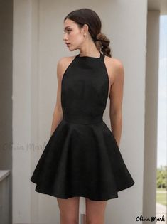 Olivia Mark - Sophisticated Halter Neck Short Party Dress with Tie-Back Style Halter Neck Mini Dress For Date Night And Prom, Halter Neck Mini Dress For Formal Parties, Formal Halter Neck Mini Dress For Party Season, Halter Neck Mini Dress For Formal Party Season, Chic Knee-length Homecoming Mini Dress, Elegant Fit And Flare Backless Dress, Spring A-line Backless Dress For Night Out, Spring Formal Backless Mini Dress, Fitted A-line Backless Evening Dress