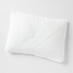 a white pillow on a white background