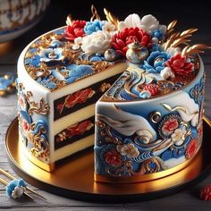 there is a cake decorated with flowers and gold trimmings on the top of it