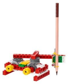 a pencil sitting on top of a lego set