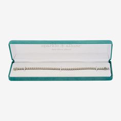 Features: In A Gift BoxCircumference: 7 1/4 InchJewelry Closure: Box ClaspLink Construction: SolidStone Cut: RoundMetal Color: Silver ToneChain Length: 7 1/4 InchChain Width: 3.88 MillimetersMetal: Pure Silver Over BronzeCare: Wipe CleanStone Type: 1 Genuine DiamondBirthstone: April BirthstoneBracelet Type: Tennis BraceletsCountry of Origin: Imported Sterling Silver Jubilee Tennis Bracelet As Gift, Sterling Silver Tennis Bracelet As A Gift, Silver Tennis Bracelet As Gift, Fine Jewelry Style, Silver Fine Jewelry Tennis Bracelet Gift, Elegant White Gold Tennis Bracelet With Box Chain, Elegant Sterling Silver Bracelet For Anniversary And Mother's Day, Classic Adjustable Diamond Bracelet For Gift, Diamond Bracelet With Box Chain For Gift, Silver Tennis Bracelet With Diamond Accents As Gift