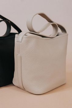 The Irina is a stylish shoulder bag featuring a spacious interior, removable zip pouch, and zipper closure. Durable and functional, it's perfect for the modern, eco-conscious consumer. Recycled Vegan Leather 12.5"W x 9"H x 5"D Strap Length: 24"-30" Strap Drop: 11"-14 Magnetic Closure Gold-Tone Hardware Removable Zip Pouch Recycled Vegan Leather Lining Everyday Top Handle Baguette Bag With Zipper, Minimalist Crossbody Shoulder Bag For Errands, Everyday Baguette Bag With Double Handle, Modern Satchel With Zipper Pocket For Errands, Everyday Tote Baguette Bag With Zipper, Modern Baguette Bag With Detachable Strap For Errands, Everyday Crossbody Baguette Bag With Zipper Closure, Everyday Crossbody Baguette Bag With Zipper, Versatile Tote Baguette Bag For Everyday Use