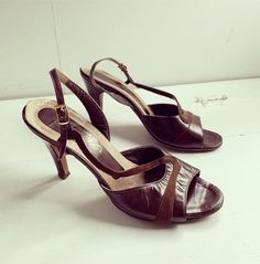 "Vintage 60s Dark Brown Ankle Strap Open Toe Heels by Amano These come from an estate of size 7 1/2 to 8 narrow shoes. I see an 8 written in however they fit smaller than 8, I wear a 6 and they fit well in front but the strap is too loose. Check measurements as these measure closer to size 6.5 possibly 7: 9 1/2\" long from inside toe to inside heel. 2\" across inner heel. 3\" across at ball of foot, inside. 3\" heel. Please see pictures for amount of wear to shoe. The soles are worn. Price refle Luxury Brown Evening Court Shoes, Vintage Brown Heels With Heel Strap, Vintage Slingback Pumps For Summer Evenings, Vintage Ankle Strap Slingback Pumps For Party, Vintage Brown Ankle Strap Heels, Vintage Summer Evening Slingback Pumps, Brown Vintage Ankle Strap Heels, Vintage Pointed Toe Slingback Pumps For Summer, Retro Formal Slingback Pumps With Pointed Toe