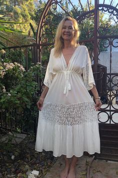 "Cotton BoHo dress, white cotton dress, SEMI SHEER,Long dress, Lace, Large, XL Really gorgeous mid length white cotton Boho dress Pretty lace insets A little bit semi sheer, so a slip might want to be worn under Seems to fit large to XL Bust is loose and measures 46\" Bodice (under breast) cinches all the way in Max is 46\" Hips 50\" and flows out from there. Length 48\" Partial slits on both sides NKDNBX Cotton BoHo dress, white cotton dress, SEMI SHEER,Long dress, Lace, Large, XL" Long Sleeve Midi Dress With Lace Trim For Beach, Beach Midi Dress With Lace Trim And Long Sleeves, Beach Long Sleeve Midi Dress With Lace Trim, Bohemian Beach Midi Dress With Lace Trim, Short Sleeve Dress With Lace Trim For Beach, V-neck Midi Dress With Lace Trim For Beach, White V-neck Free Size Maxi Dress, Lace Midi Dress With Short Sleeves For The Beach, Beach Lace Midi Dress With Short Sleeves