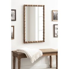 The Kate and Laurel Prindle rectangle mirror features a turned wood design that adds a classic touch to your space. Crafted with the utmost care, the mirror boasts a sturdy wooden material frame that ensures durability and longevity. The frame profile of this wall mirror has a vintage scalloped edge that resembles spindles. Not only is this mirror visually appealing, but it also serves a practical purpose. Hang it in your living room, bedroom, or entryway to create an illusion of a larger space, Baby Boy Nursery Mirror, Boy Nursery Mirror, Staircase Spindles, Nursery Mirror, Wood And Mirror, Mantel Mirror, Rectangle Wall Mirror, Mantle Mirror, Traditional Mirror