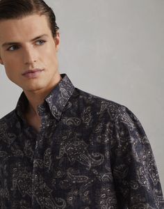 Paisley basic fit shirt with button-down collar A retro-inspired pattern in the season's colors updates the classic style of this button-down collar shirt. The pure cotton fabric is enriched with the Paisley motif, while the basic fit, with comfortable, straight lines, guarantees ease and versatility. Elegant Patterned Cotton Shirt, Classic Paisley Print Button-up Shirt, Classic Patterned Formal Shirt, Elegant Shirt With Button Closure And Patterned Design, Classic Patterned Top For Formal Occasions, Elegant Patterned Button-up Shirt, Classic Patterned Shirt With Spread Collar, Classic Cotton Shirt With Paisley Print, Casual Shirt With Paisley Print And Spread Collar