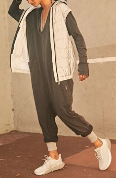 Kick it all the way back in this stretch cotton jumpsuit fixed with a cozy hood, roomy pockets and a very relaxed fit. 95% cotton, 5% elastane Machine wash, tumble dry Imported Cotton Jumpsuit, Hot Shots, Long Sleeve Onesie, Fp Movement, Black Jumpsuit, Stretch Cotton, Order Online, Onesies, Layering