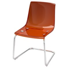 an orange plastic chair with chrome legs and a clear seat cover on the back of it