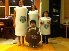 three children dressed up as starbucks bean bags and one holding a bag of coffee beans