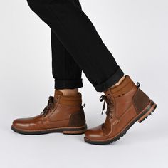 The search for the perfect boot ends here. The Reeves by Vance Co. will keep you on your feet with comfort and ease with a 6 mm Tru Comfort Foam� insole and a cushioned collar. Smooth vegan leather shapes this lace-up silhouette and a tractioned durable rubber sole grounds the look. Mens Ankle Boots, Closed Toe Shoes, Brown Ankle Boots, Round Toe Heels, Collar Designs, Black Ankle Boots, Boot Shop, Casual Boots, Chukka Boots