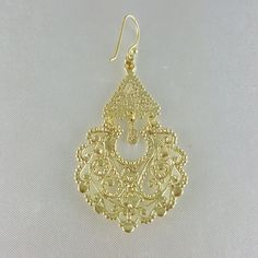 ♥️ Comfortable ♥️Exquisite 18K Gold Filled over Bronze Filigree Earrings♥️Lightweight and comfortable for all-day wear♥️Intricate craftsmanship with a contemporary design♥️Tarnish-resistant and long-lasting 18K gold plated overlay♥️Combines luxury and durability for enduring beautyElevate your style with our exquisite 18K Gold Plated Earrings. Meticulously crafted with precision and attention to detail, this pendant exudes a timeless elegance that perfectly complements the modern professional. D Ornate Chandelier Earrings For Formal Occasions, Elegant Brass Earrings For Celebration, Elegant Dangle Plug Earrings With Intricate Design, Ornate Dangle Earrings, Ornate Chandelier Earrings For Festive Occasion, Elegant Pierced Chandelier Earrings For Party, Ornate Metal Chandelier Earrings For Festive Occasions, Elegant Gold Chandelier Dangle Earrings, Elegant Gold Dangle Chandelier Earrings