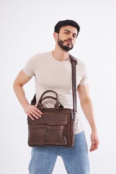 - Our product is 100% genuine leather. - It is produced in master hands with quality materials and delicate handwork. - Dimensions 29 x 39 cm Business Cognac Textured Leather Satchel, Cognac Textured Leather Satchel For Business, Cognac Textured Leather Business Satchel, Rectangular Business Briefcase With Leather Strap, Brown Smooth Grain Business Laptop Bag, Brown Satchel With Smooth Grain For Business, Leather Shoulder Bag Briefcase With Smooth Grain, Brown Leather Business Bags, Brown Soft Leather Briefcase For Business