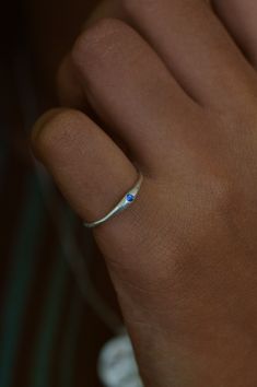 The Siyum gem ring is a true minimalist piece, a fine seamless round band is hand brushed finished allowing a contemporary aesthetic. Perfect for everyday, once you take it off you won't take it off! A petite round blue Sapphire adds a beautiful detail and personalised touch. Use the drop down to select your ring size.If you are unsure of your ring size refer to our size guide. Please select your ring size carefully, and reach out if you have any questions. DetailsSterling Silver Handcrafted in Sapphire Silver Ring, Gem Ring, Contemporary Aesthetic, Blue Sapphire, Silver Ring, Size Guide, Sapphire, Ring Size, Silver Rings