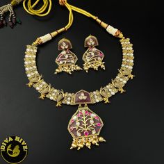 Our special Handcrafted fusion necklace is curated on brass ,hand painted and meena work on real stones pendant. This is a absolutely gorgeous and trending Piece.Metal: Brass with 92.5 SilverPolish: Gold Nickel FreePerfect for all occasion(Party, Wedding ,Engagement)Note: This product is handcrafted and vintage, it has slight irregularities in design which only add to its beauty. Due to the differences in displays of computers/laptops/phones or may be photographic lighting sources the color of t Meenakari Pendant Jewelry For Puja, Fusion Dual-tone Necklaces For Festivals, Dual-tone Fusion Necklaces For Festivals, Kundan Chandbali Necklaces As Gift, Kundan Chandbali Necklaces For Gift, Enamel Pendant Jewelry For Wedding, Enamel Pendant Jewelry For Weddings, Festive Fusion Dual-tone Necklace, Unique Hand Painted Necklaces For Festivals