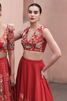 Red bemberg silk lehenga with floral digital printed motifs and sequins embroidery. Comes with a zari embroidered blouse. - Aza Fashions Red Choli With Resham Embroidery, Sleeveless Floral Embroidery Lehenga, Resham Embroidery Lehenga Sleeveless, Red Sleeveless Choli For Reception, Sleeveless Red Choli For Reception, Red Designer Wear Choli, V-neck Choli With Resham Embroidery, Sleeveless Choli For Reception, Sleeveless Wedding Top With Intricate Embroidery