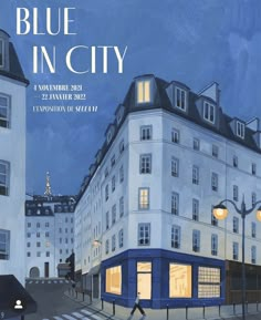 the cover of blue in city magazine, featuring an image of a man walking across a street