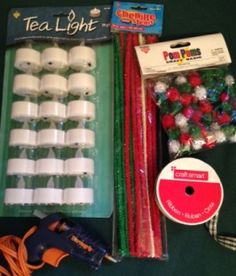 the contents of a tea light kit are laid out