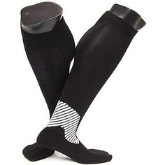 Take your training to the next level with the Lian LifeStyle compression knee high sport socks. Made with Compression Fit Technology, these knee-high sports socks can boost your muscle containment while graduated fit increases circulation and cuts down on shin splints. An specially engineered footbed to supports the Achilles and adds comfort in the ball and heel of the foot. Great for any sport practice or games and can speed up the recovery process after a taxing workout or training session. Ot Breathable Supportive Stretch Socks, Black Breathable Training Socks, Breathable Black Socks For Training, Breathable Black Training Socks, Breathable Compression Sports Socks, Breathable Stretch Running Socks, Sporty Black Socks For Gym, Black Stretch Moisture-wicking Socks, Sporty Black Gym Socks