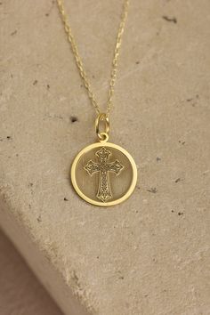 Gold Cross Pendant - Cross Gold Necklace ● Material of pendant: Solid Gold 14k ( REAL GOLD ) ● Metal Stamp: 14k ( REAL GOLD ) ● The pendant is available in 5 sizes: - 12,7 mm / 0.5 inches (Diameter) - 14,0 mm / 0,55 inches ( Diameter ) In the photos - 15,3 mm / 0.6 inches ( Diameter ) - 16,5 mm / 0,65 inches ( Diameter ) - 19,1 mm / 0,75 inches ( Diameter ) ( In the photos the size is 14mm / 0.55 inches Diameter ) ( Jump Ring inner diameter: 4 mm ) ● Material of chain: Solid gold 14k ( REAL GOLD 14k Gold Cross Necklace Tarnish Resistant, 14k Gold Spiritual Cross Pendant Necklace, Spiritual 14k Gold Cross Pendant Necklace, Commemorative Pendant Locket Jewelry, 14k Yellow Gold Cross Pendant Charm Necklace, 14k Gold Cross Necklace For Spiritual Wear, Spiritual 14k Gold Locket Necklace, Yellow Gold Charm Necklaces With Cross Pendant, Gold 14k Cross Pendant Charm Necklace