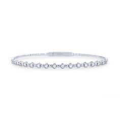 A clean, modern look crafted with a flexible design, this alternating bezel bangle features 0.50 carats of round brilliant cut diamonds. Diamond Tennis Bracelet With Bezel Setting, Classic Diamond Bangle Bracelet With Bezel Setting, Modern Single Cut Diamond Bangle Tennis Bracelet, Modern White Gold Diamond Bracelet With Bezel Setting, Modern Flexible Tennis Bracelet, Modern Flexible Round Tennis Bracelet, Minimalist Diamond Tennis Bracelet With Bezel Setting, Modern Diamond White Tennis Bangle Bracelet, Modern Diamond Bracelet With Bezel Setting