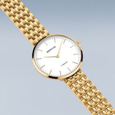 Ladies Titanium  New In: Our new ladies' watches from the Titanium Collection are truly eye-catching. Available in silver, gold and a bicolor look, they are the perfect choice for fashion-conscious women looking for an elegant and robust watch.  The watches are made of high-quality titanium. This material is extremely strong, ultra-light and hypoallergenic. The titanium bracelets fit smoothly and give the watch an elegant and delicate look. The high wearing comfort makes them perfect for daily u Elegant Gold Stainless Steel Watch, Classic Gold Stainless Steel Watch, Timeless Yellow Gold Stainless Steel Watch, Timeless Gold Watch For Everyday, Elegant Gold Watch With Polished Finish, Classic Yellow Gold Analog Jewelry And Watches, Classic Gold Stainless Steel Jewelry And Watches, Classic Business Jewelry With Analog Detail, Elegant Gold Watches With Subdials